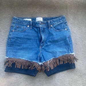 Cut off jean shorts with fringe